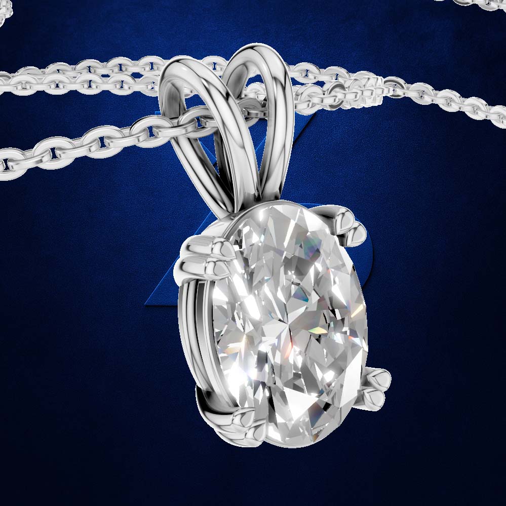 An oval-cut clear gemstone pendant in a polished silver-toned setting with a matching chain, shown against a deep blue background.