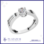 A silver-tone solitaire engagement ring with a round-cut clear gemstone, displayed on a white background with a blue border. The brand name 'PLATIZEM' is visible at the bottom.