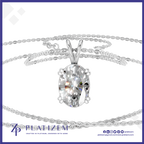 An oval-cut clear gemstone pendant in a silver-toned prong setting on a delicate silver chain necklace, shown against a white background with the brand name 'Platizem' at the bottom.