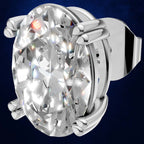 An oval-cut diamond ring set in a polished silver-colored metal prong setting, shown against a dark blue gradient background.
