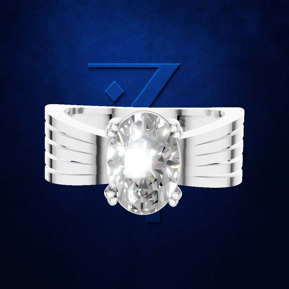 A silver-toned ring with a large oval clear gemstone, shown against a dark blue textured background with a stylized blue logo behind it. Per the color rules, the clear gemstone does not contribute a color, so only the silver metal setting is counted.