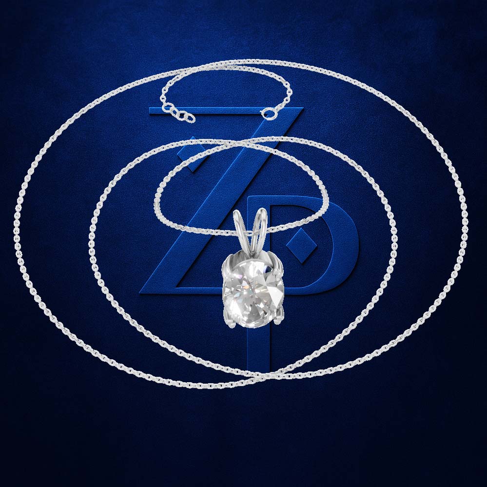 A silver-toned chain necklace with a large clear oval pendant, arranged in concentric circles on a dark blue background with a stylized blue ZP logo.