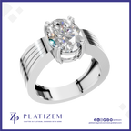 A silver-toned oval solitaire engagement ring with a brilliant round-cut clear gemstone, shown on a white background with the brand name 'PLATIZEM' at the bottom.