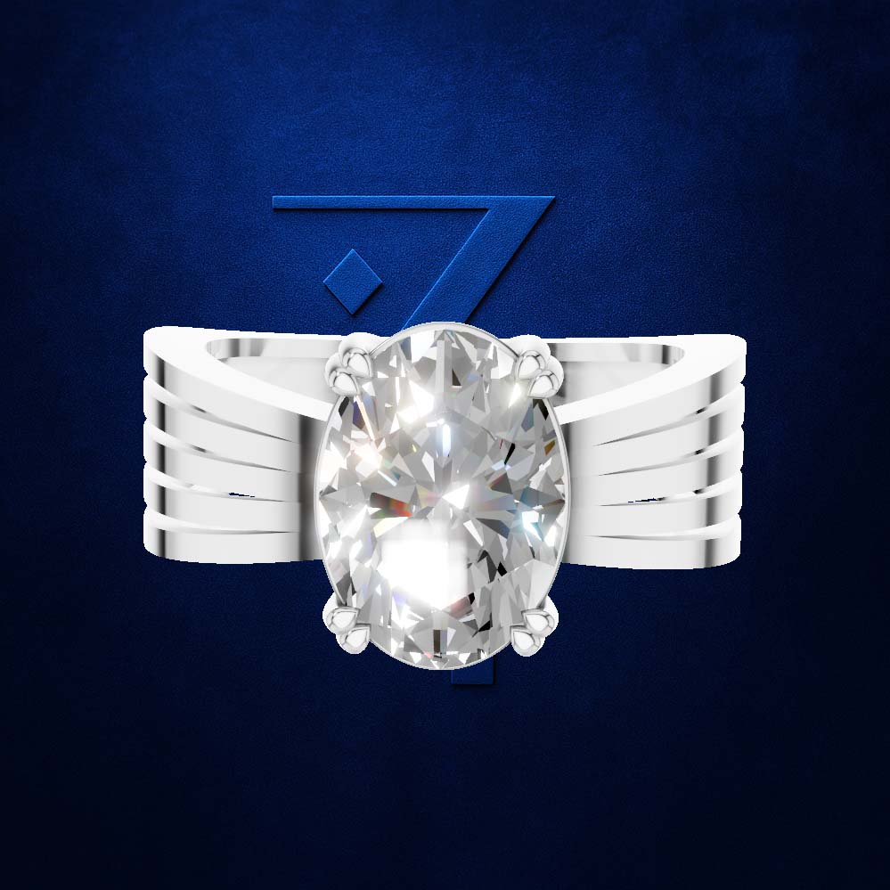 A white gold or platinum ring featuring a large oval-cut clear gemstone in a prong setting, with a wide, multi-strand band. The ring is centered against a dark textured blue background with a subtle blue geometric logo behind it.