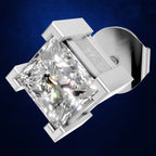 A silver-toned diamond stud earring featuring a large princess-cut diamond in a four-prong setting, shown against a dark blue textured background.