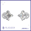 A pair of princess-cut diamond stud earrings in a silver-toned prong setting, displayed on a white background with a blue border. The brand logo 'PLATIZEM' is visible at the bottom.