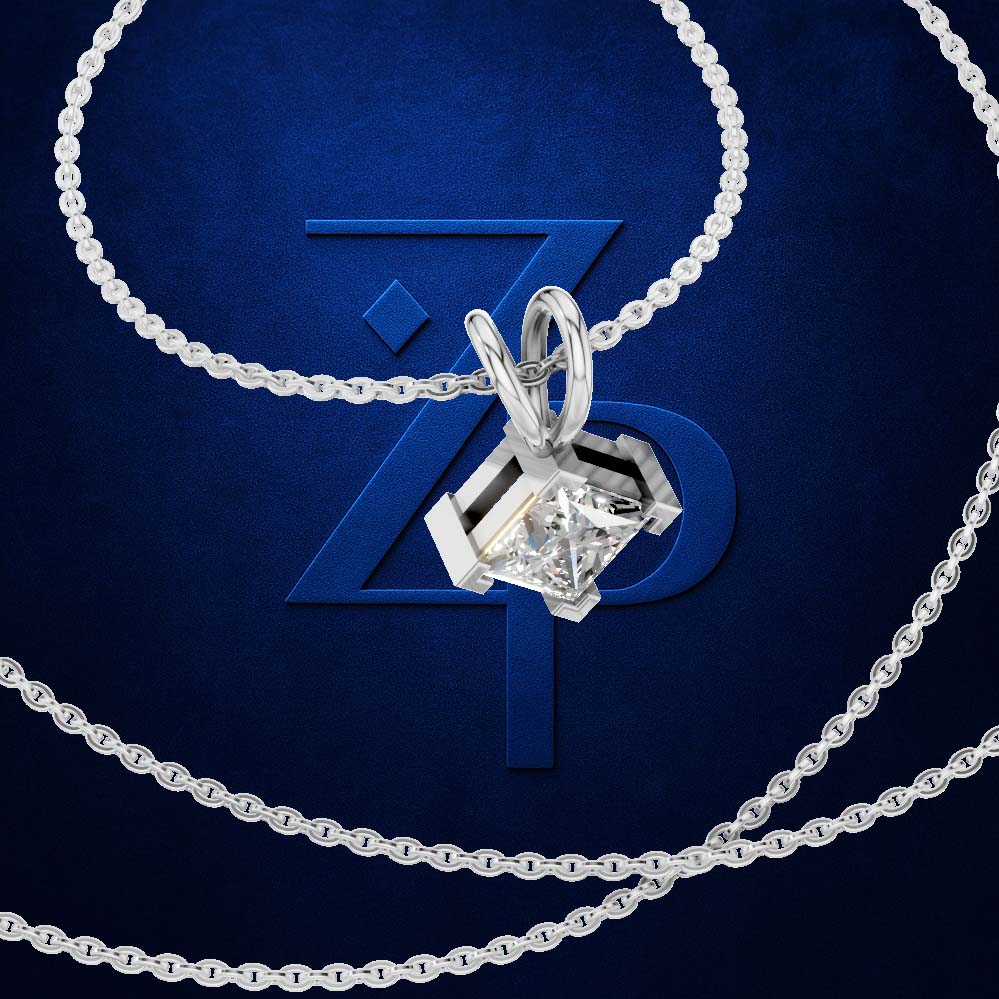 A silver-toned necklace with a geometric pendant featuring a clear gemstone, displayed against a dark blue background with a large stylized 'ZP' logo.