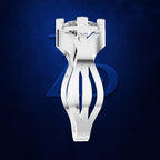 A white sculptural ring stand or jewelry display holder with a clear gemstone at the top, centered against a dark textured blue background with a faint blue geometric logo behind it.