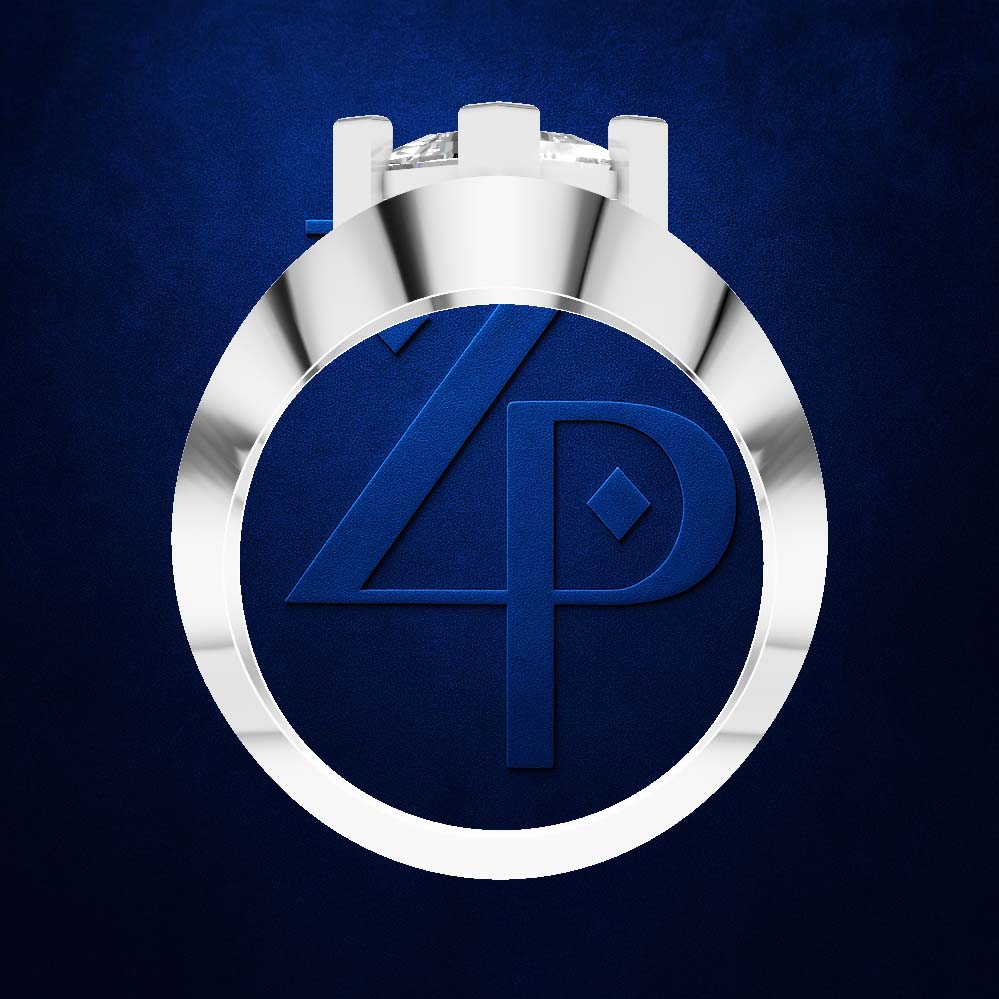 A polished silver-toned circular pendant or medallion with a raised blue emblem featuring stylized letterforms, shown on a textured dark blue background.