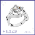 A silver-plated ring featuring a square princess-cut diamond center stone, presented on a white background with a blue border and the brand name 'PLATIZEM' at the bottom.