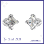 A pair of platinum stud earrings with large clear princess-cut diamonds, displayed on a white background with a blue border. The brand name 'PLATIZEM' is visible at the bottom.