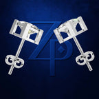 A pair of silver-toned geometric stud earrings with clear gemstones, displayed on a textured dark blue background with a large blue stylized 'ZP' logo behind them.
