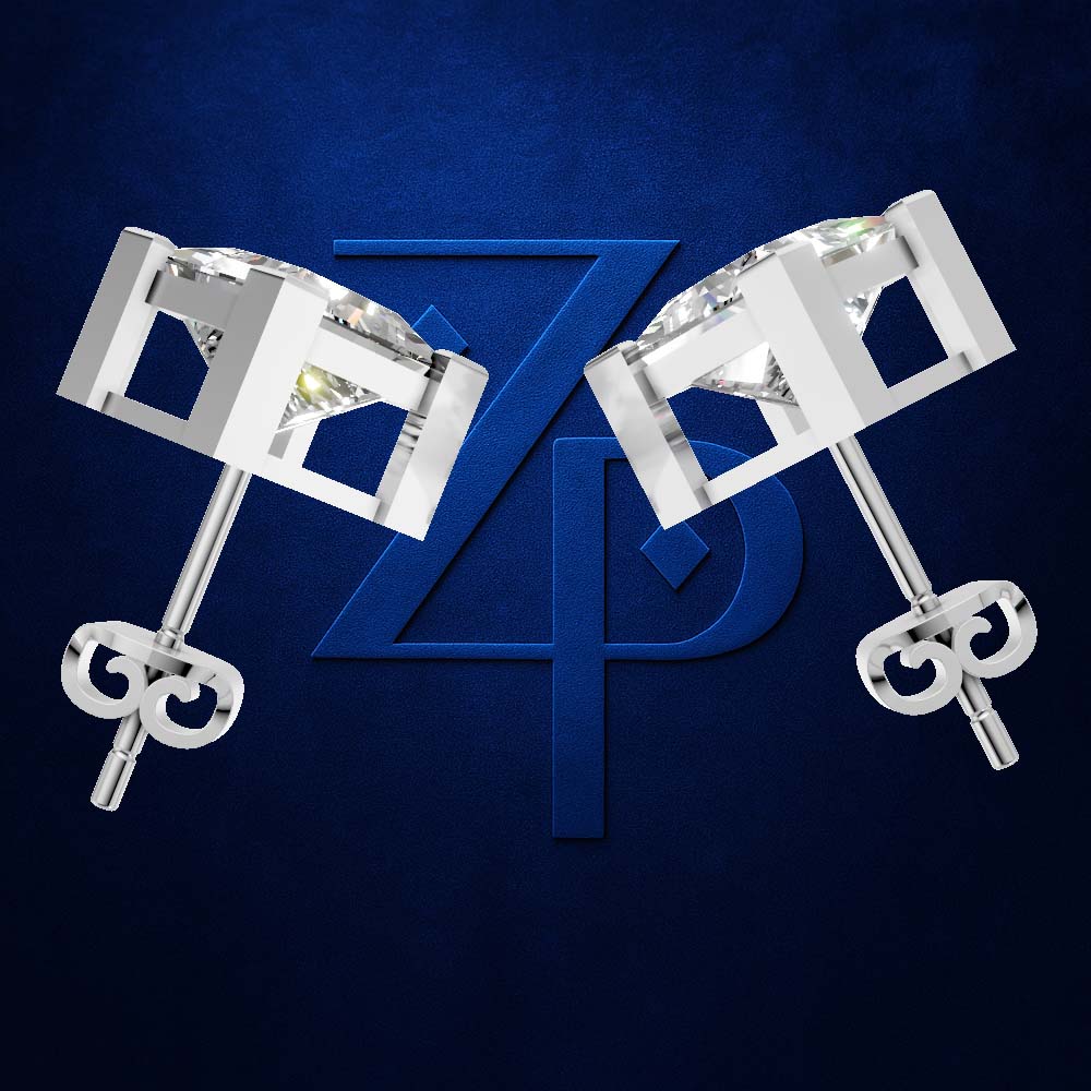 A pair of silver-toned geometric stud earrings with clear gemstones, displayed symmetrically on a textured dark blue background with a large stylized 'ZP' logo behind them.