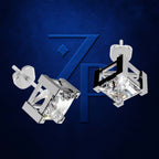 A pair of silver-toned geometric stud earrings with clear faceted crystal cubes, shown against a dark blue textured background with a large stylized '7P' logo.