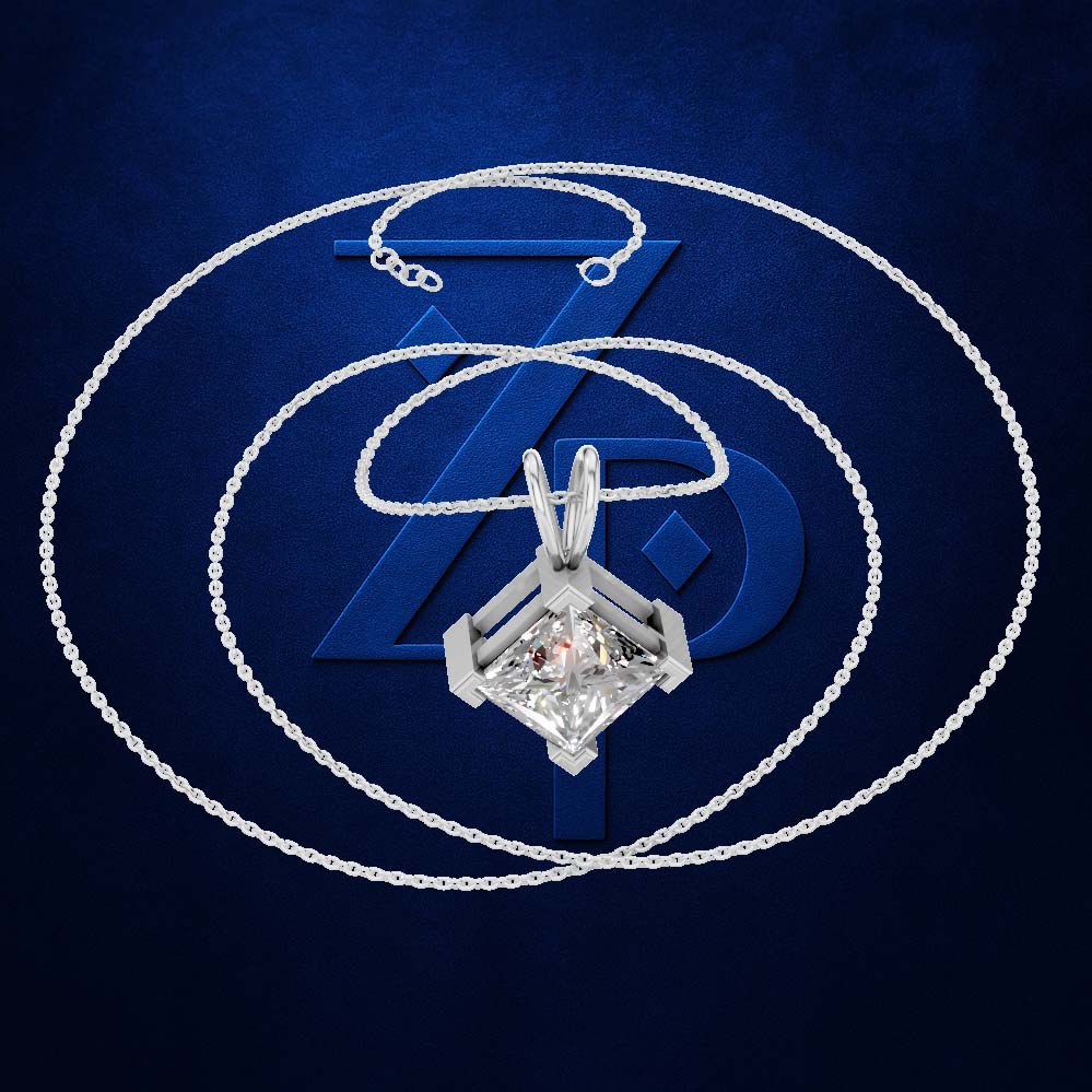 A silver-toned chain necklace with a geometric diamond-shaped pendant set with clear gemstones, displayed on a dark blue textured background with a large blue 'ZPD' logo behind it.