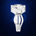 A silver-toned men's ring with a geometric, sculptural band and a large clear gemstone in a prong setting, shown against a dark textured blue background.