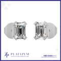 A pair of emerald-cut diamond stud earrings in a silver-toned setting, displayed on a white background with a blue border and the Platizem brand logo at the bottom.