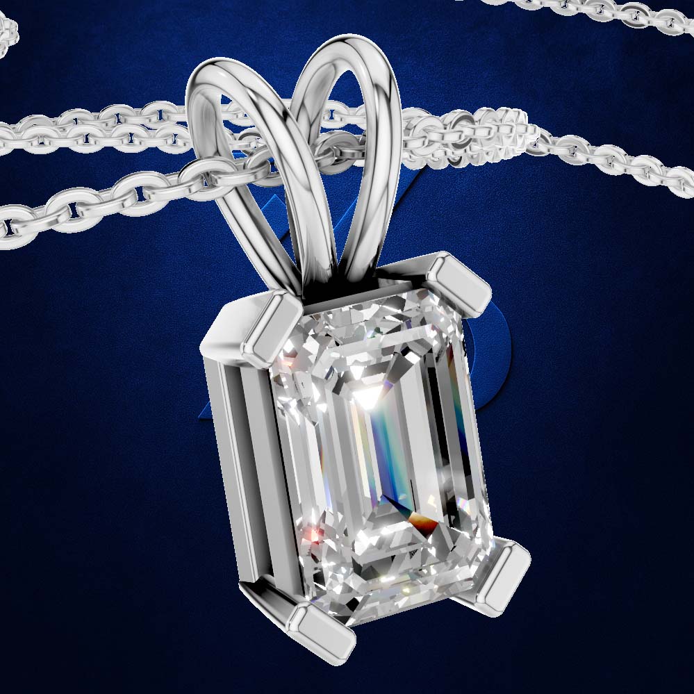 A silver pendant necklace featuring a large rectangular emerald-cut clear gemstone in a four-prong setting, suspended from a matching silver chain against a dark blue background.