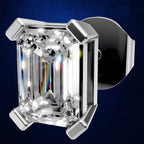 An emerald-cut diamond stud earring in a polished silver-colored metal setting, shown against a dark blue textured background.