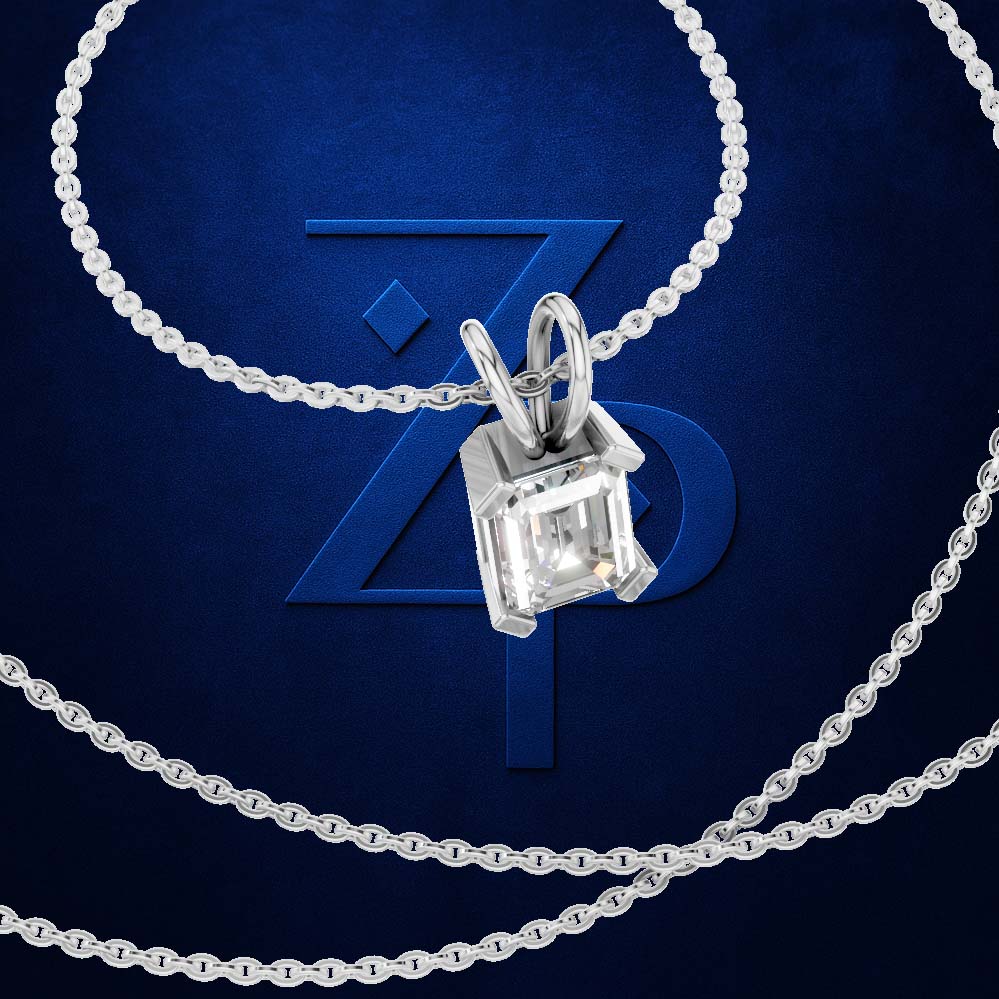 A silver-toned necklace with a square-cut clear gemstone pendant, shown on a dark blue textured background with a large stylized 'ZP' logo behind it.