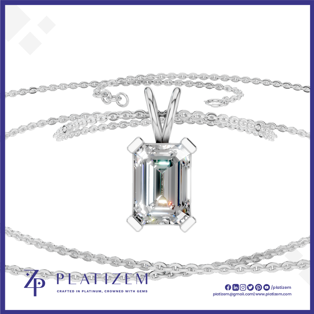 A silver-tone necklace with a large rectangular emerald-cut clear gemstone pendant, displayed on a white background with a branded logo banner at the bottom.