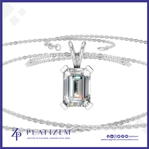 A silver-tone necklace with a large rectangular emerald-cut clear gemstone pendant, displayed on a white background with a branded logo banner at the bottom.