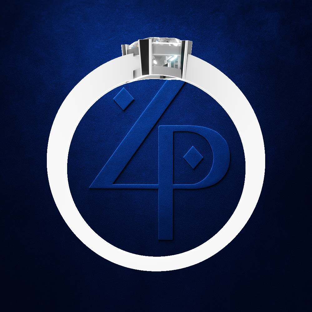 A silver ring with a large clear gemstone, featuring a circular white inlay and a blue monogram design with the letters 'Z' and 'P' on a textured dark blue background.