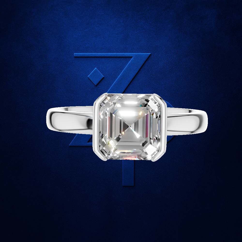 A silver ring with a large square emerald-cut clear gemstone, centered against a textured dark blue background with a stylized blue 'Z' logo.