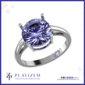 Round Cut Purple Gemstone Solitaire Ring Held by Four Claw Prong Tips