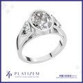 Oval Cut Bezel Setting Three Stone Lab Grown Diamond Engagement Ring