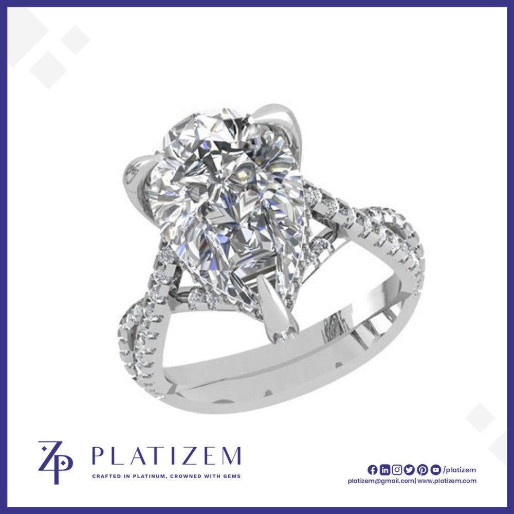 Pear Shape Diamond Ring Featuring a Twisted Shank and Hidden Halo Accent