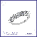 Five Even Round Diamonds Prong Set Across a Substantial Wide Band
