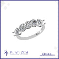 Five Round Brilliant Diamonds Set Along a Gracefully Curved Band