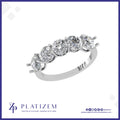 Five Round Diamonds Set Together on a Sweeping Curved Prong Band