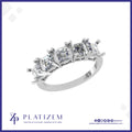 Five Matching Asscher Cut Diamonds Set Across a Wide Diamond Band