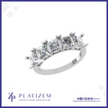 Five Square Asscher Cut Diamonds Set Together on a Wide Diamond Band