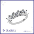 Five Square Asscher Cut Diamonds Set Along a Substantial Wide Band