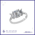 Emerald Cut Three Stone Ring Where the Center Diamond Sets the Tone