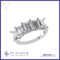 Five Bold Emerald Cut Diamonds Arranged Across a Substantial Prong Band