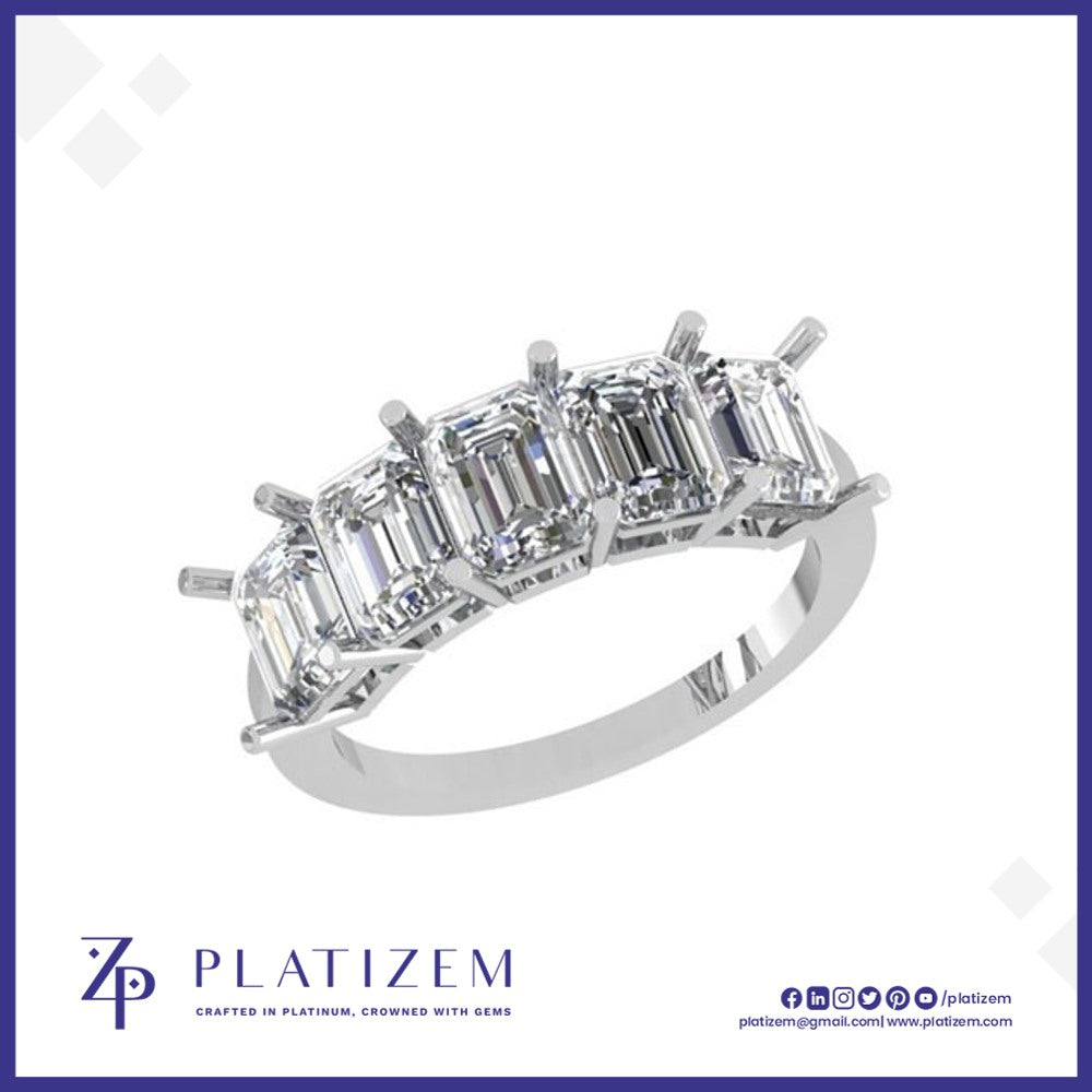 Five Bold Emerald Cut Diamonds Arranged Across a Substantial Prong Band