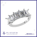 Five Graduated Emerald Cut Diamonds Set Along a Polished Prong Band