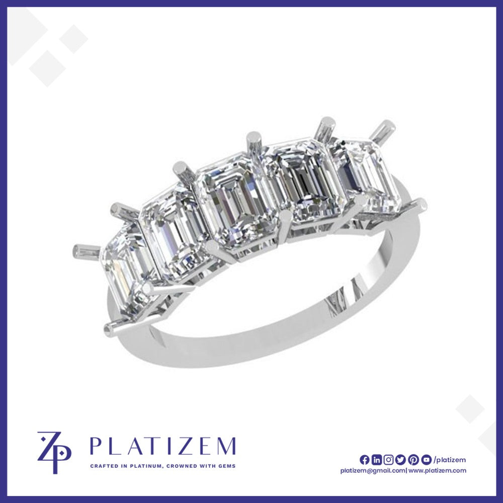 Five Graduated Emerald Cut Diamonds Set Along a Polished Prong Band