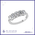 Five Emerald Cut Diamonds Framed Individually in Modern Bezel Settings