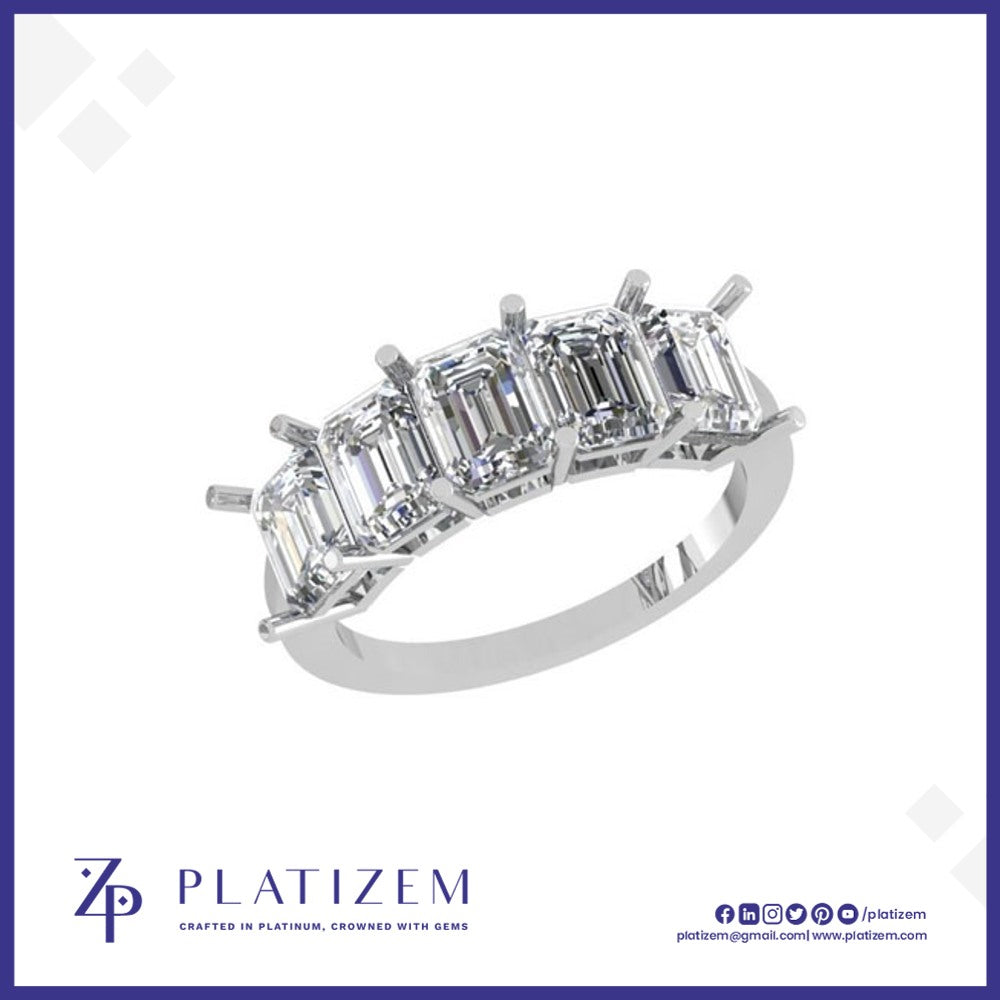 Five Emerald Cut Diamonds Set in a Row Across a Classic Prong Band