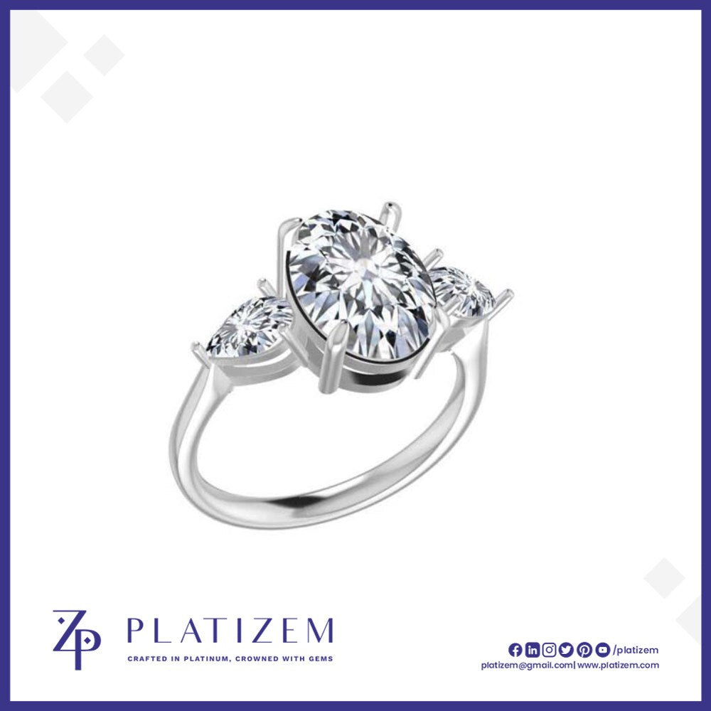 Oval Cut Diamond Ring Flanked by Pear Shape Diamonds on Either Side