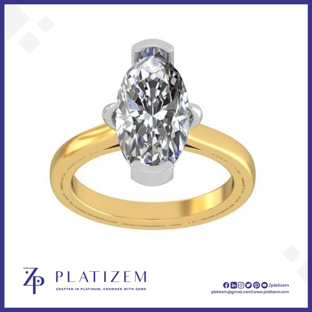 Elongated Oval Cut Diamond Solitaire Ring Featuring a Two Tone Prong Setting