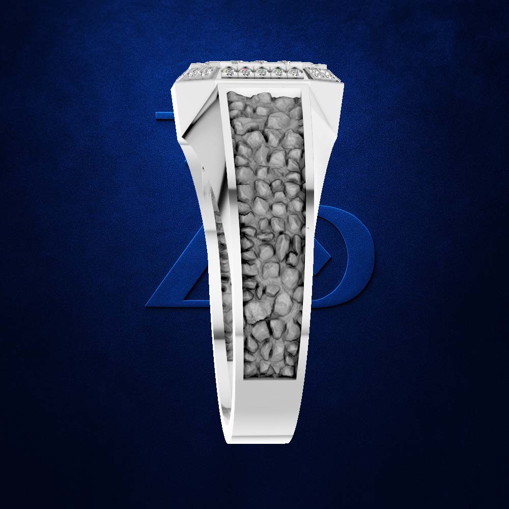 A white gold or platinum ring with a central channel filled with small gray stones, shown on a dark blue textured background with a faint blue geometric logo behind it.
