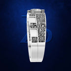 A white ring band with a geometric, angular design and a textured gray inlay, shown in a 3D cutaway view against a dark blue textured background.