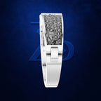 A silver-toned ring with a textured gray inlay, shown on a dark blue textured background with a subtle blue geometric logo behind it.