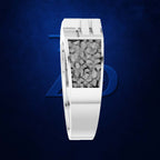A white rectangular watch face or jewelry piece with a textured gray stone-like center, shown on a dark blue background with a faint blue geometric logo behind it.